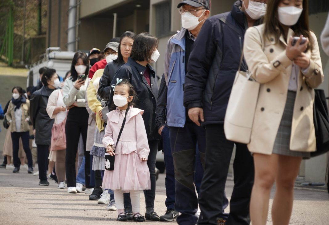 south-koreans-go-to-the-polls-wearing-masks-and-plastic-gloves-in-election-held-amid-coronavirus-pandemic