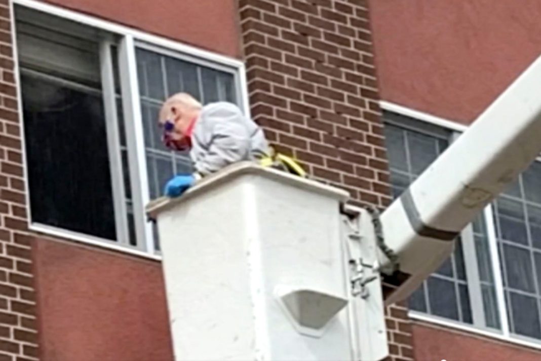 husband-uses-bucket-truck-to-see-wife-at-us-nursing-home-after-being-separated-by-coronavirus
