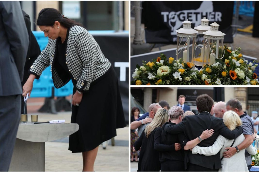 priti-patel-lights-candle-for-reading-terror-attack-victims-at-moving-twilight-vigil