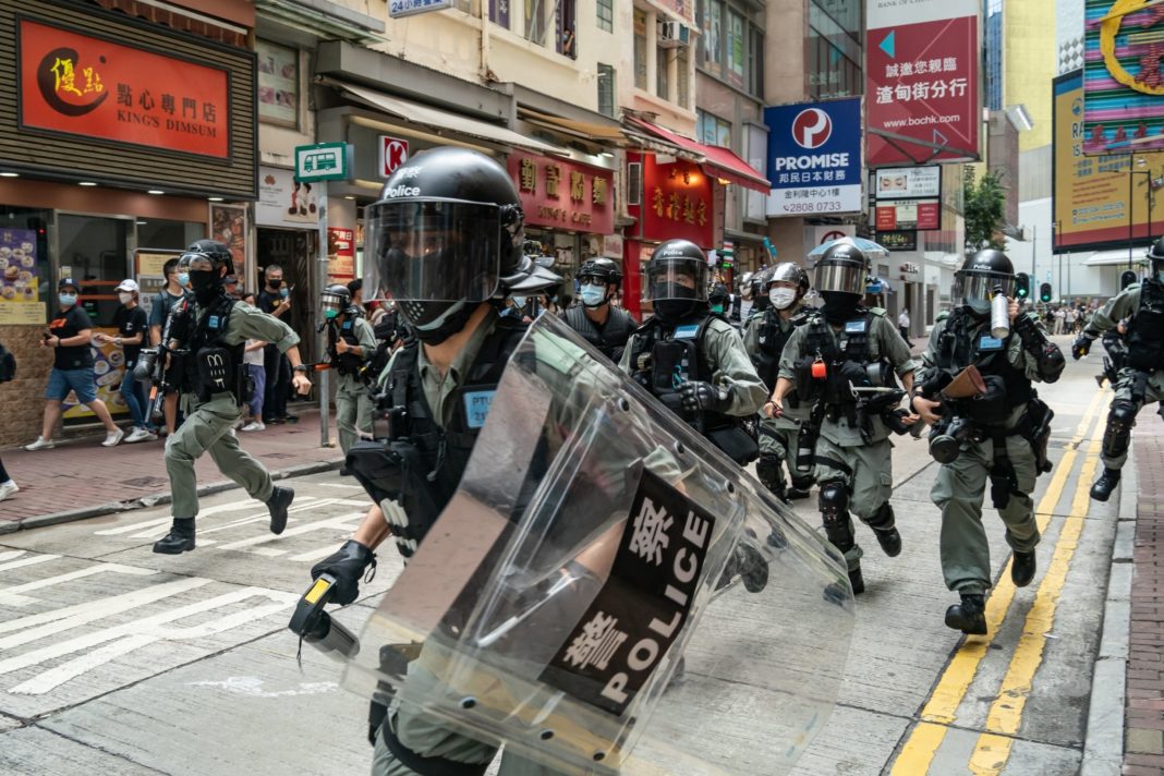 hong-kong-protests:-man-arrested-'on-flight-to-london'-after-attack-on-officer-as-clashes-continue-over-security-law