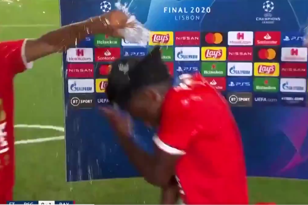 alphonso-davies-gets-soaked-in-champagne-during-tv-interview-after-bayern-munich-clinch-champions-league