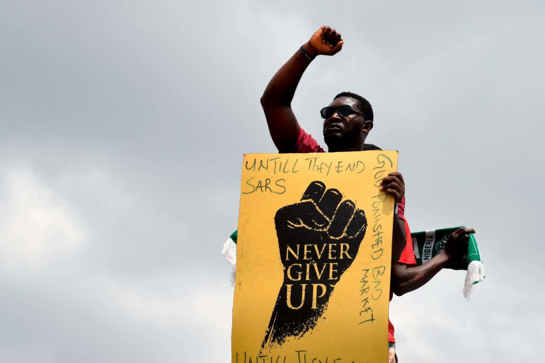 nigeria's-president-muhammadu-buhari-blames-'hooliganism'-for-deaths-of-civilians-during-protests