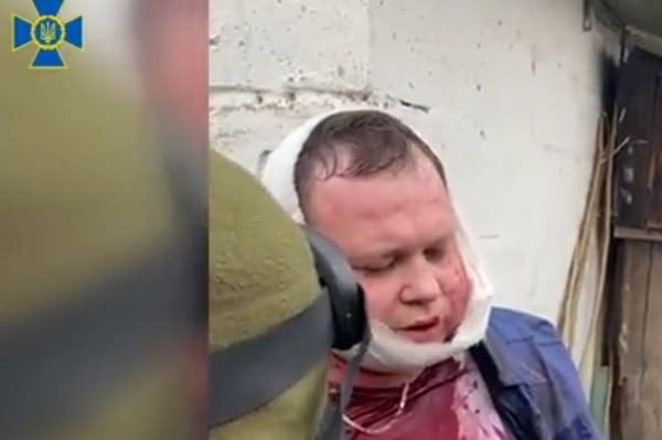 russian-pilot-who-bombed-syria-met-with-president-assad-has-been-captured-in-ukraine-after-his-jet-was-shot-down