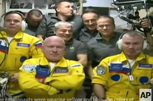 three-russian-cosmonauts-arrive-at-the-international-space-station-wearing-ukrainian-colours